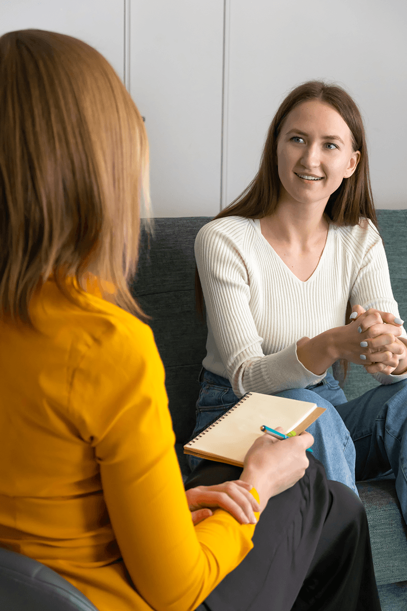 Young woman talking to a therapist