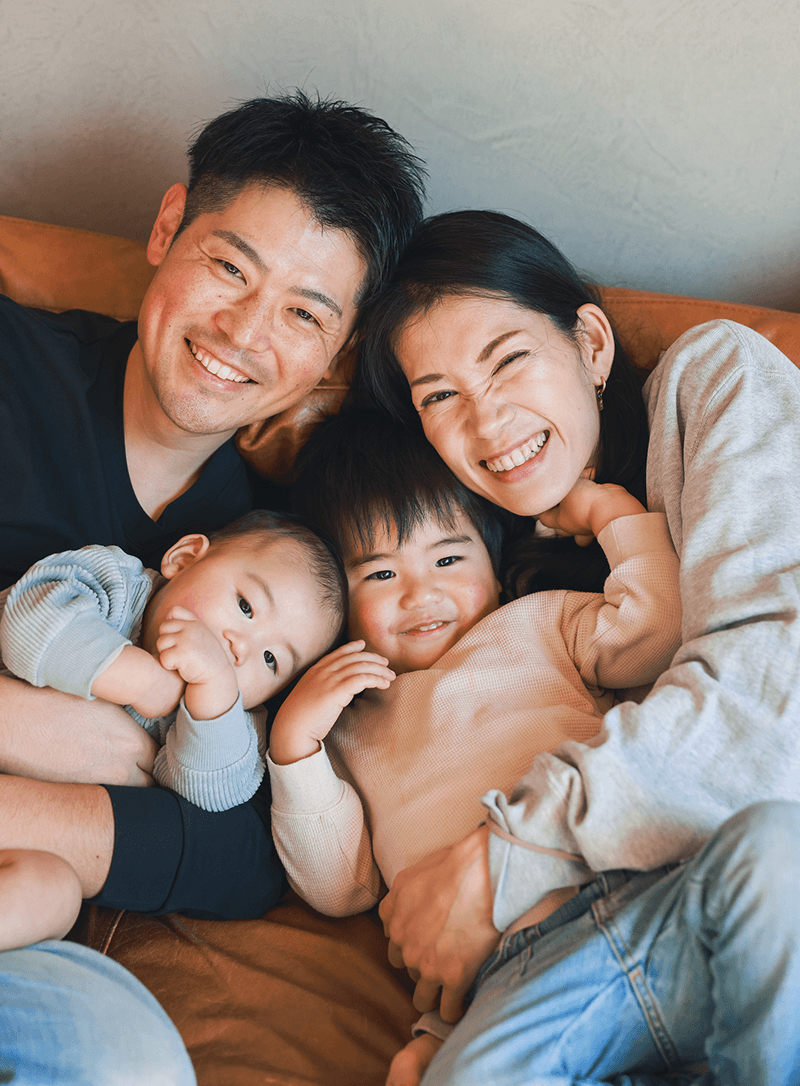 Parents holding their kids